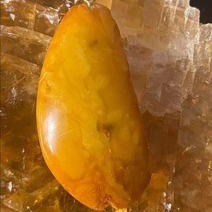Raw amber yoke pendant